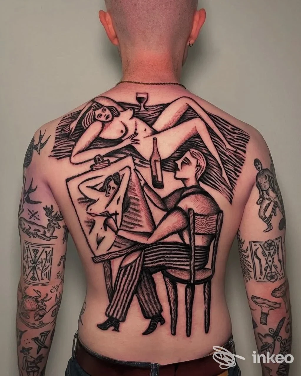 Grande tatuaggio nero stilizzato su tutta la schiena di una persona, foto fornita da Nero Di Seppia Tattoo & Piercing, Cattolica.