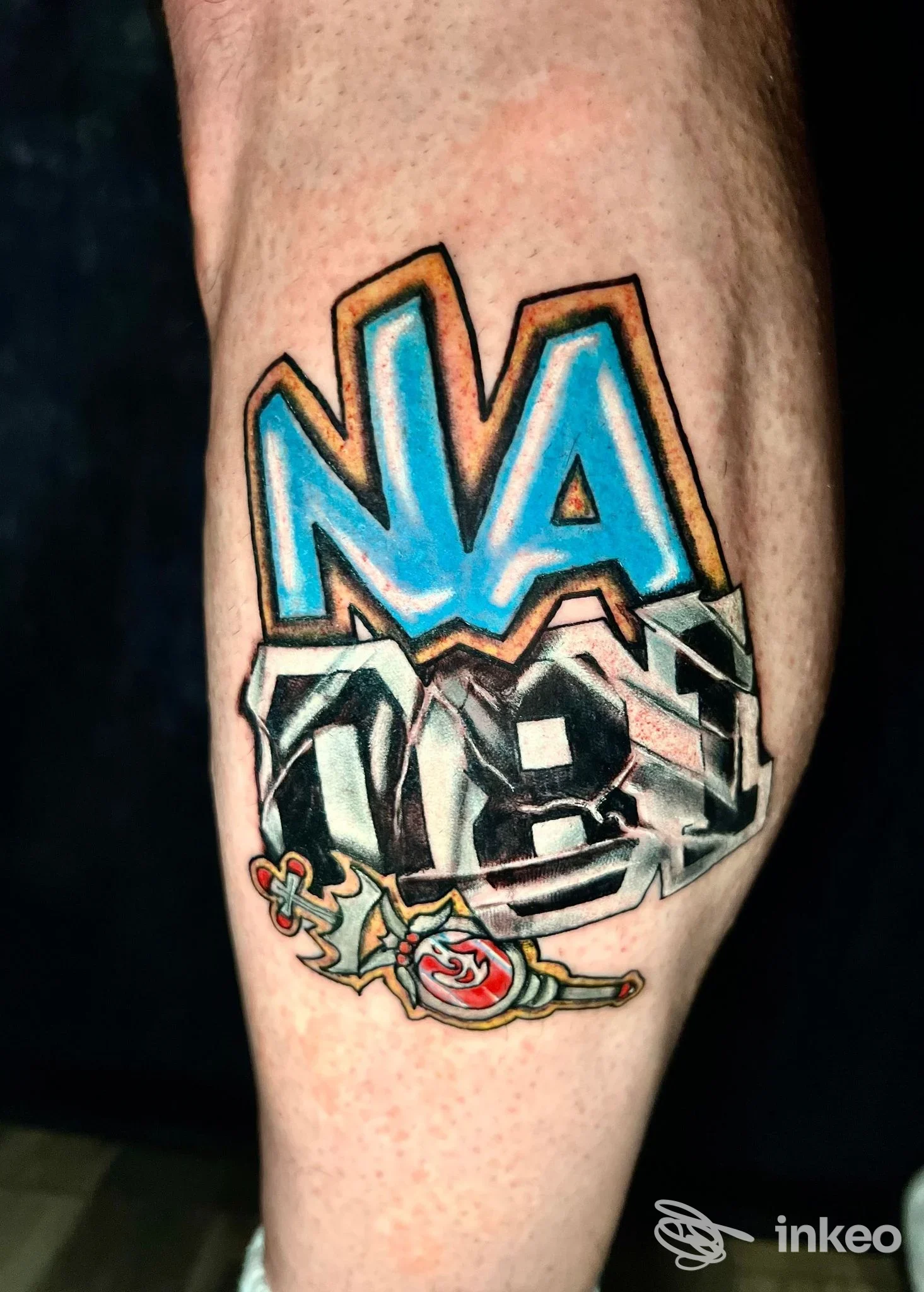 Tatuaggio colorato in stile lettering/graffiti sull'avambraccio, realizzato da SG INK Tattoo & Piercing a Roma.