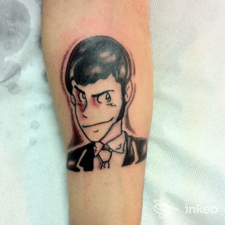 Tatuaggio in stile cartone animato sul lato interno dell'avambraccio, Piercing & Tattoo Roma Mr. Fax, Roma.