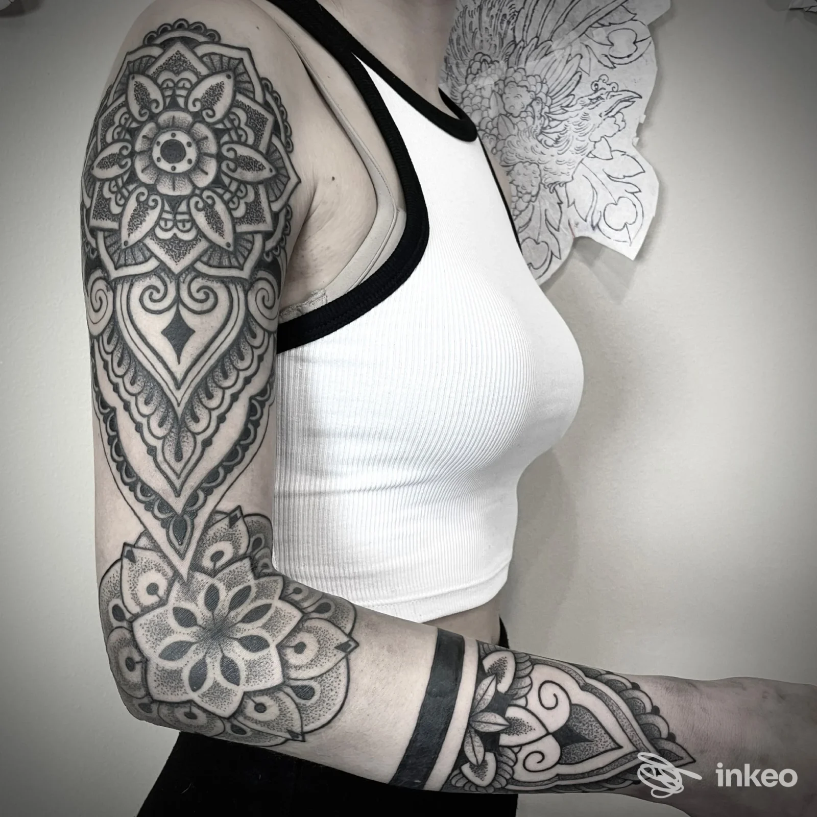 Braccio sinistro tatuato con motivi ornamentali/mandala — Goa Tattoo Shop, Genova.