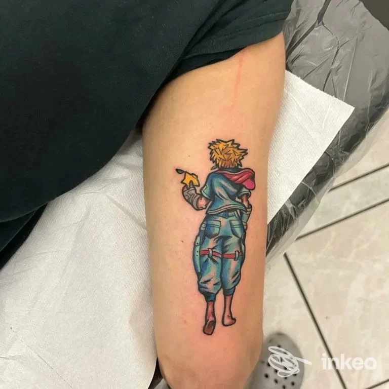 Tatuaggio a colori di un personaggio visto di spalle sull'avambraccio, Classic Tattoo, San Benedetto del Tronto.