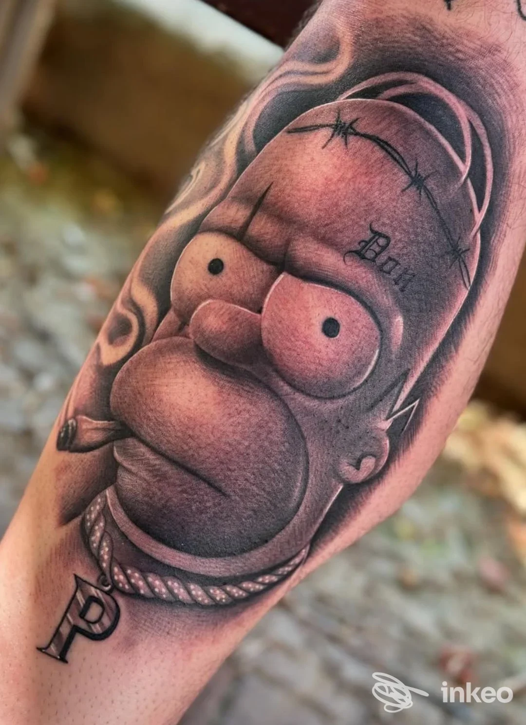 Tatuaggio in bianco e nero raffigurante un personaggio animato sull'avambraccio, eseguito da Malamanera Tattoo Shop a Nichelino.
