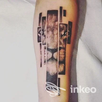 Tatuaggio su avambraccio con volto di leone frammentato, realizzato da Unbroken Tattoo Bari a Bari.