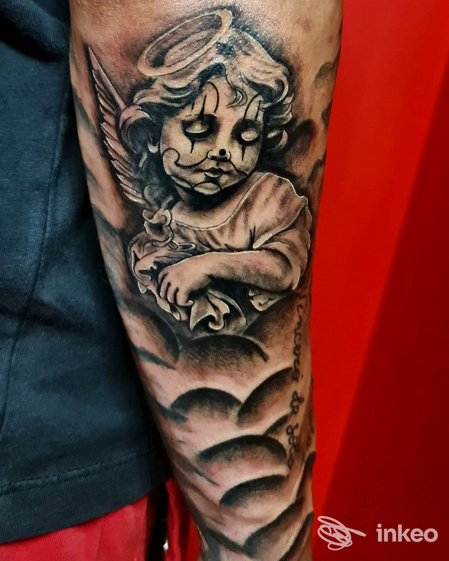 Tatuaggio black & grey di un cherubino su avambraccio, foto inviata da TATTOO MADE IN CLA è PIERCING a Grottaglie.