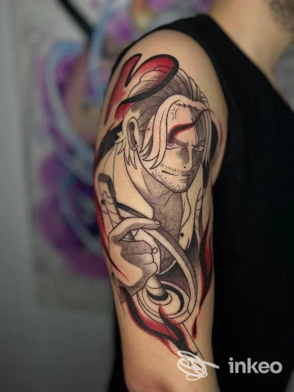 Grande tatuaggio a stile fumetto sul braccio superiore, fotografia fornita da Karma Tattoo Studio di Conte Gianluca, Surbo.