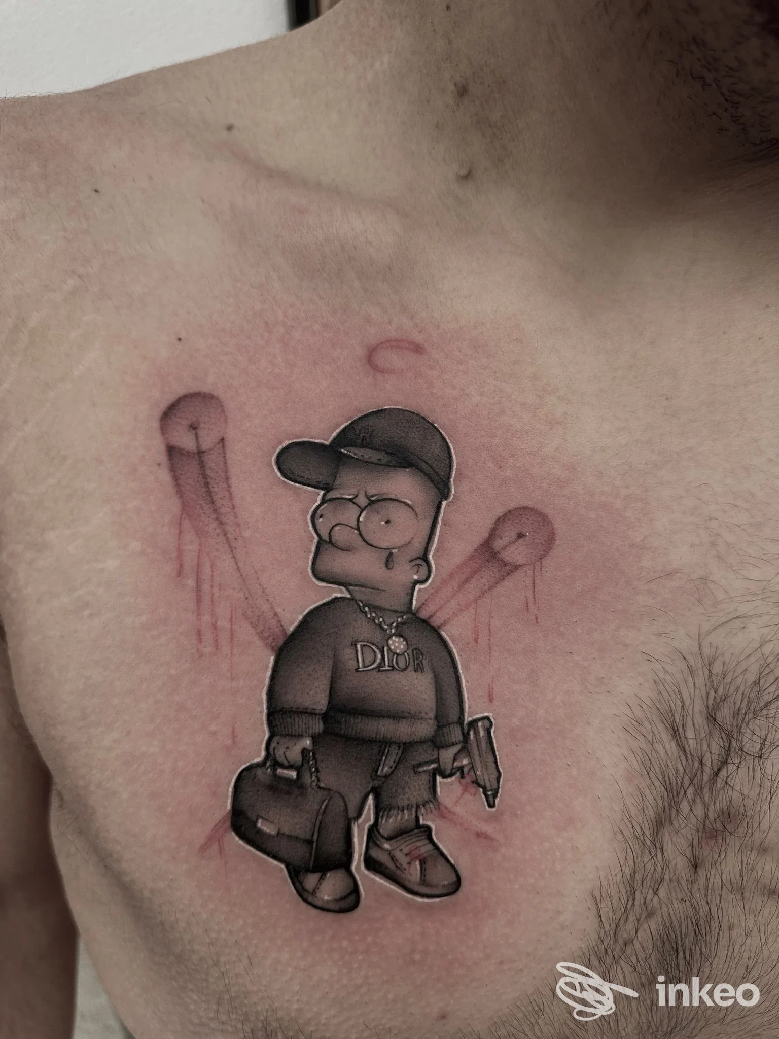 Tatuaggio a petto con personaggio cartoon realizzato da DAN TATTOO STUDIO, Ceglie Messapica.