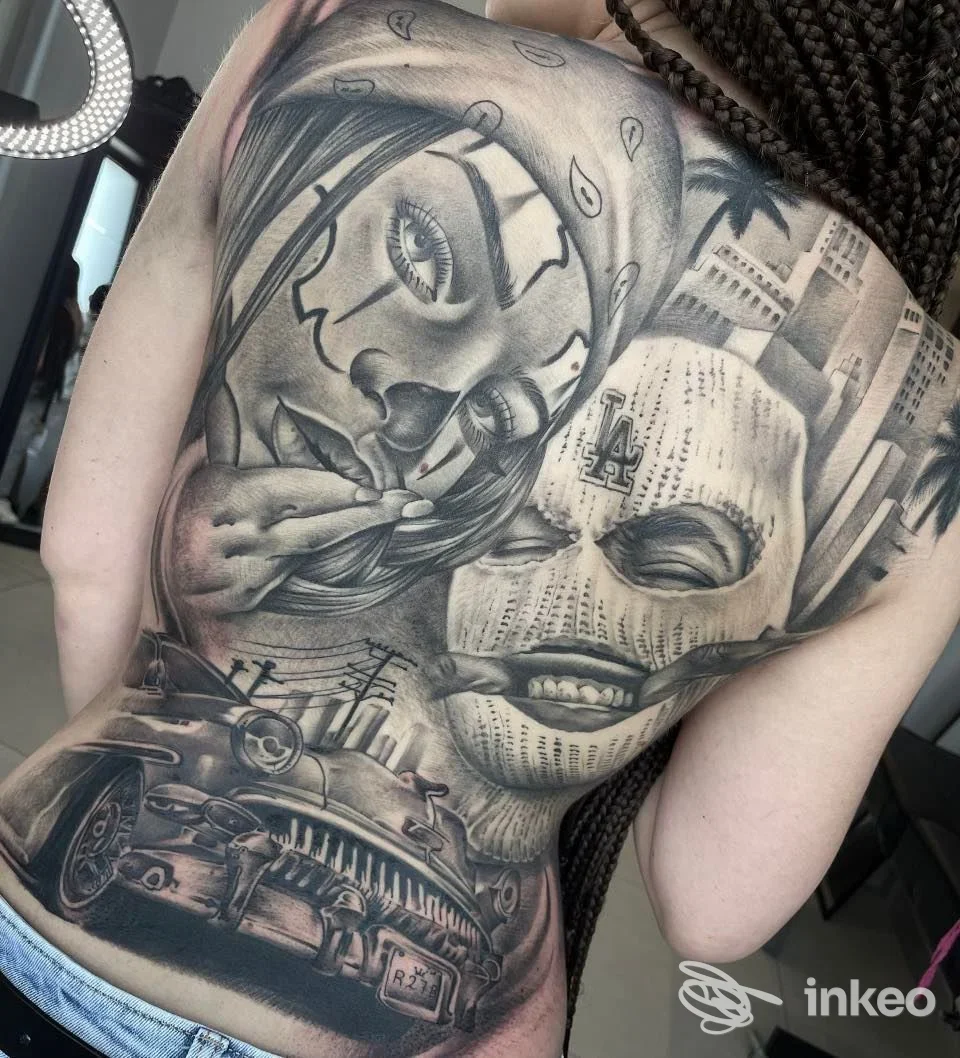 Grande tatuaggio sulla schiena con volti e auto, realizzato da RG Tattoo Studio a San Severo.