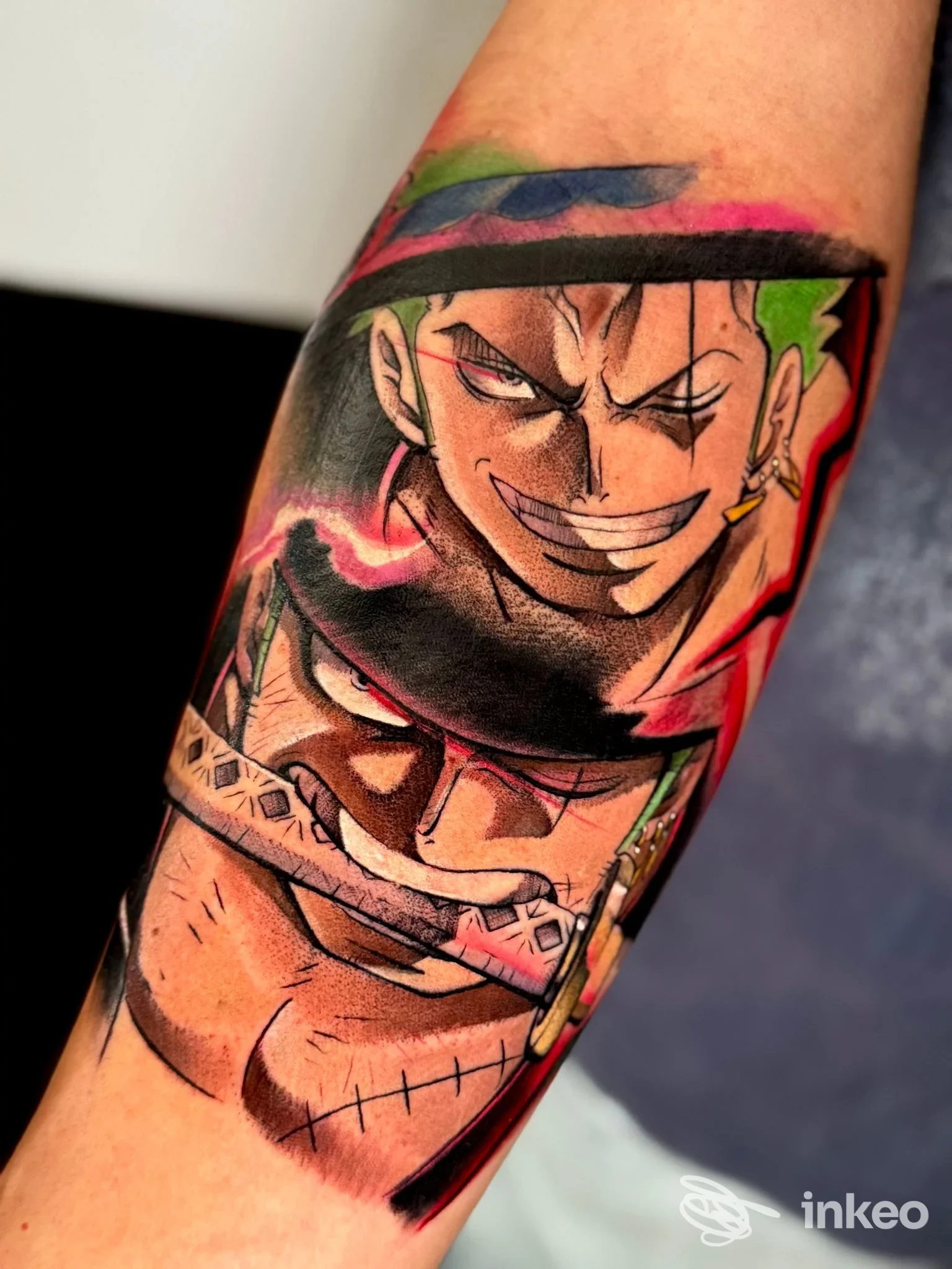 Tatuaggio a colori sull'avambraccio con personaggi in stile anime, realizzato da Kame House Tattoo Studio a Palermo.