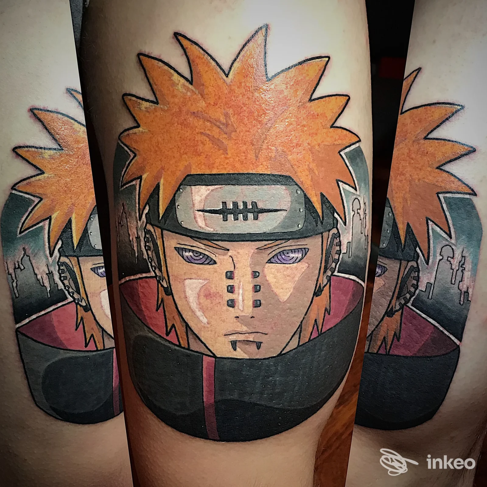 Grande tatuaggio su avambraccio raffigurante un volto in stile anime con capelli arancioni e occhi viola. Studio Wet Paint Tattoo, Brunico.