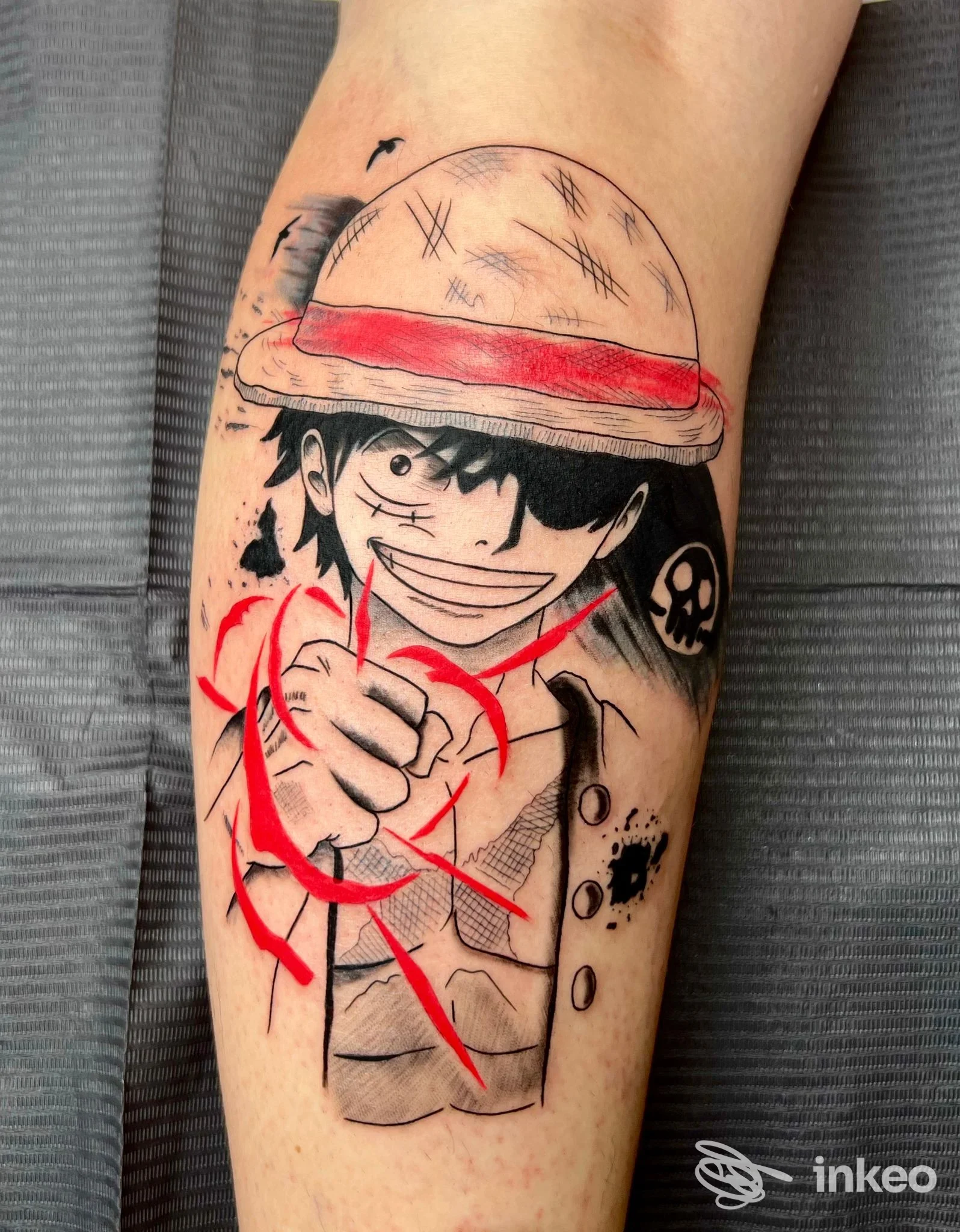Tatuaggio su avambraccio raffigurante un personaggio in stile sketch con dettagli rossi, La Bella e La Bestia Tattoo, Perugia.