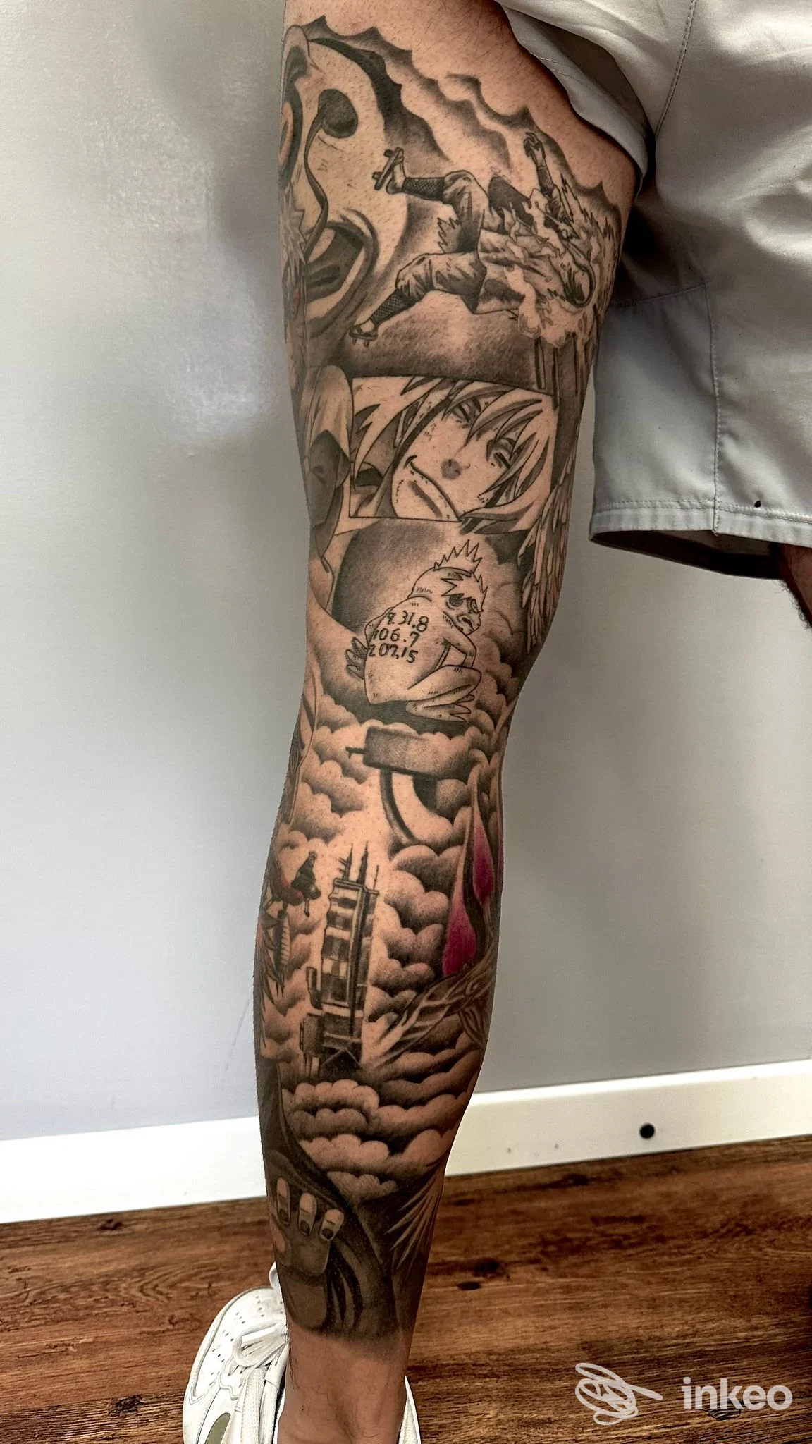 Tatuaggi in bianco e nero su gamba destra, dettaglio di pezzi in stile anime. Black Diamond Tattoo & Piercing, Fossalta di Portogruaro.