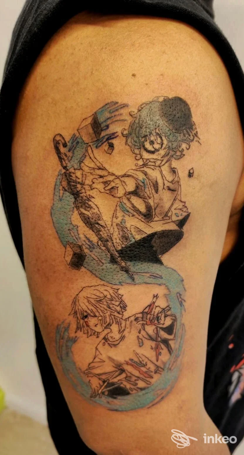 Tatuaggio su braccio con due personaggi in stile anime e una spirale azzurra, realizzato da LIBRE TATTOO a Schio.