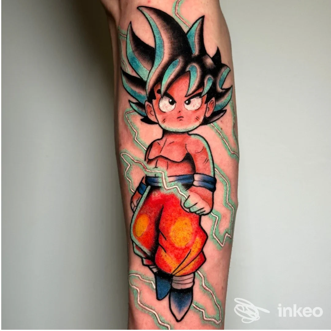 Tatuaggio a colori di personaggio anime sull'avambraccio, foto scattata per Peachy’s Studio - Tattoo & Piercing a Matera.