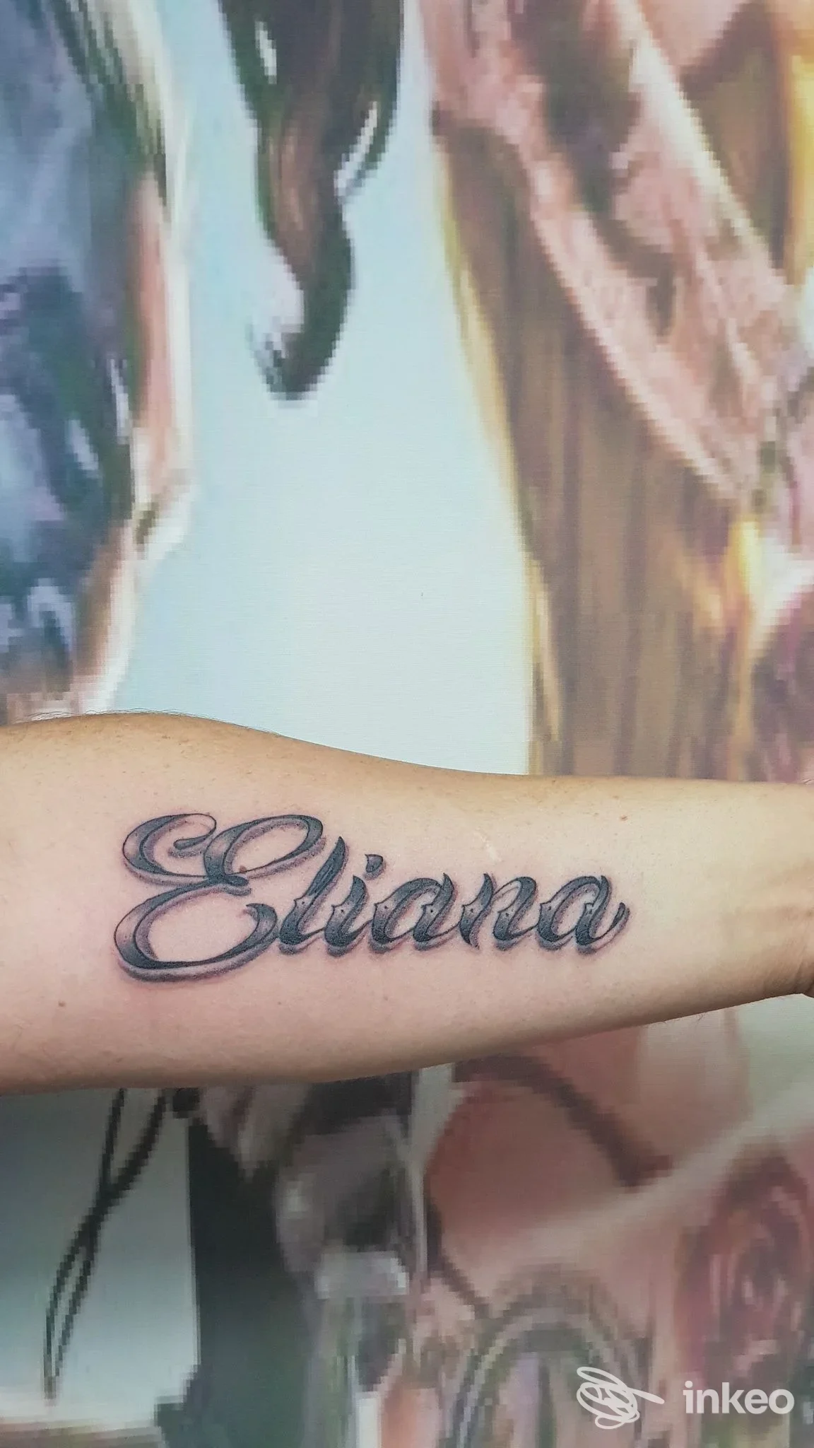 Primo piano di un tatuaggio con la scritta 'Eliana' sull'avambraccio, realizzato presso Studio Tattoo & Piercing Mr.OrcoWind di Leonardo Parente, Villa d’Agri.