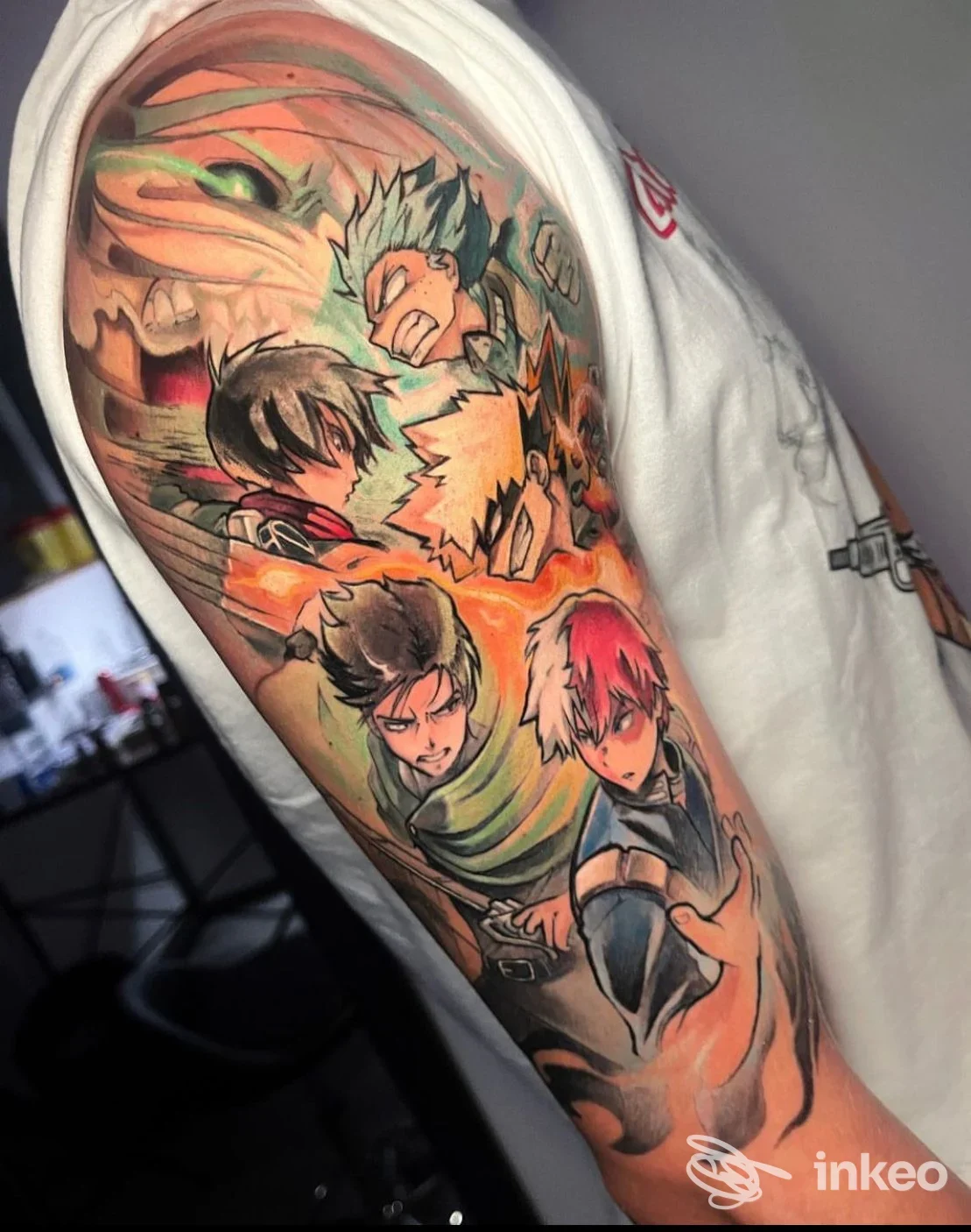 Grande tatuaggio a colori in stile manga sull'avambraccio, foto fornita da The Goldfish Tattoo Studio, Firenze.