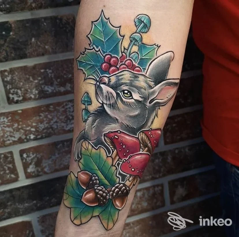 Tatuaggio colorato su avambraccio con coniglio, funghi e foglie — Rename Tattoo Studio, Campi Bisenzio.