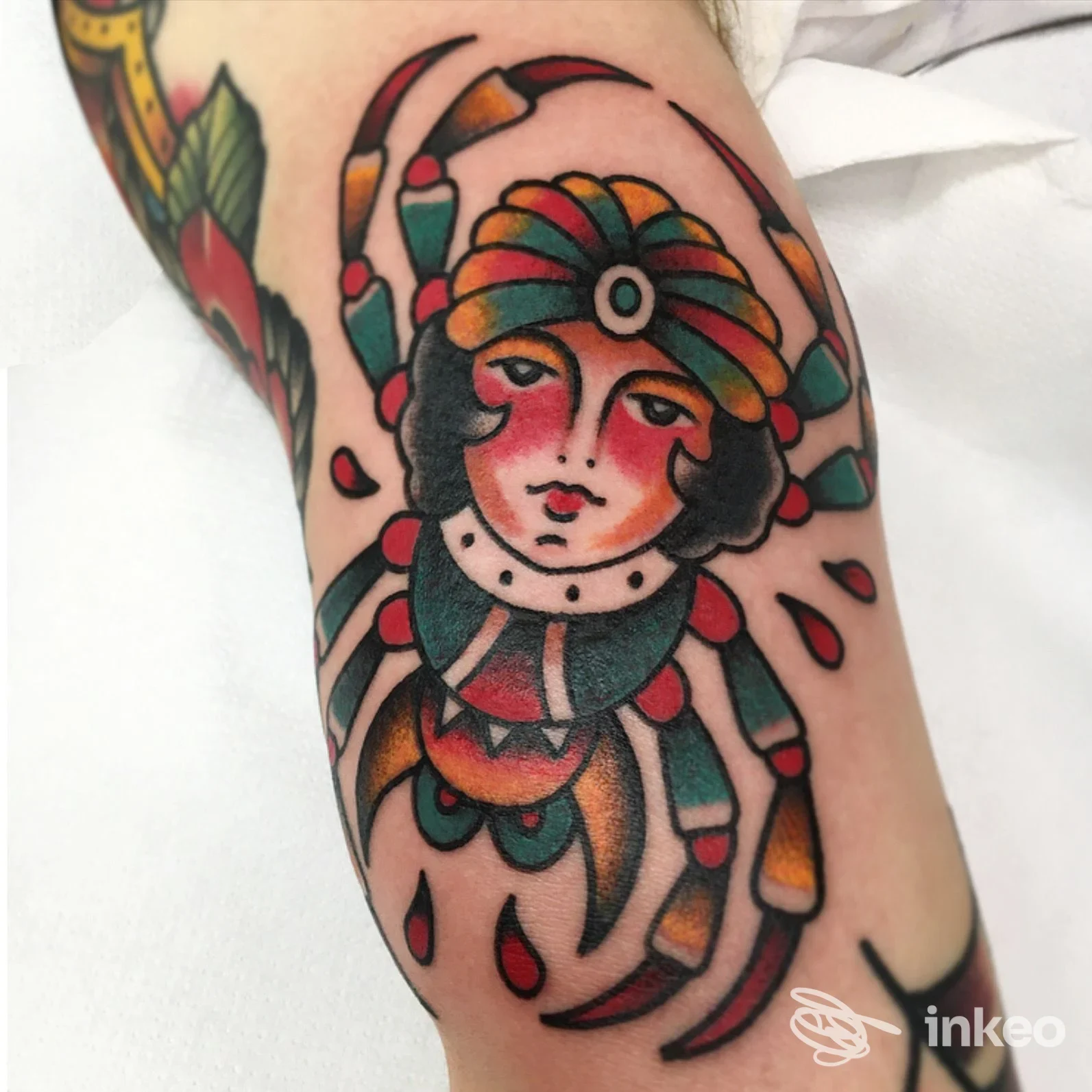 Tatuaggio tradizionale a colori su avambraccio realizzato da La Cantina Dell'inchiostro a Povegliano Veronese.