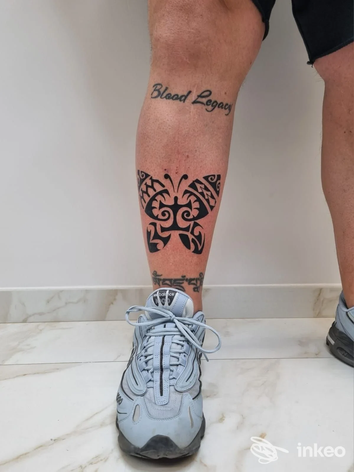 Tatuaggi sul polpaccio con farfalla tribale e scritta, ANICHINI MARTINA, Poggibonsi.
