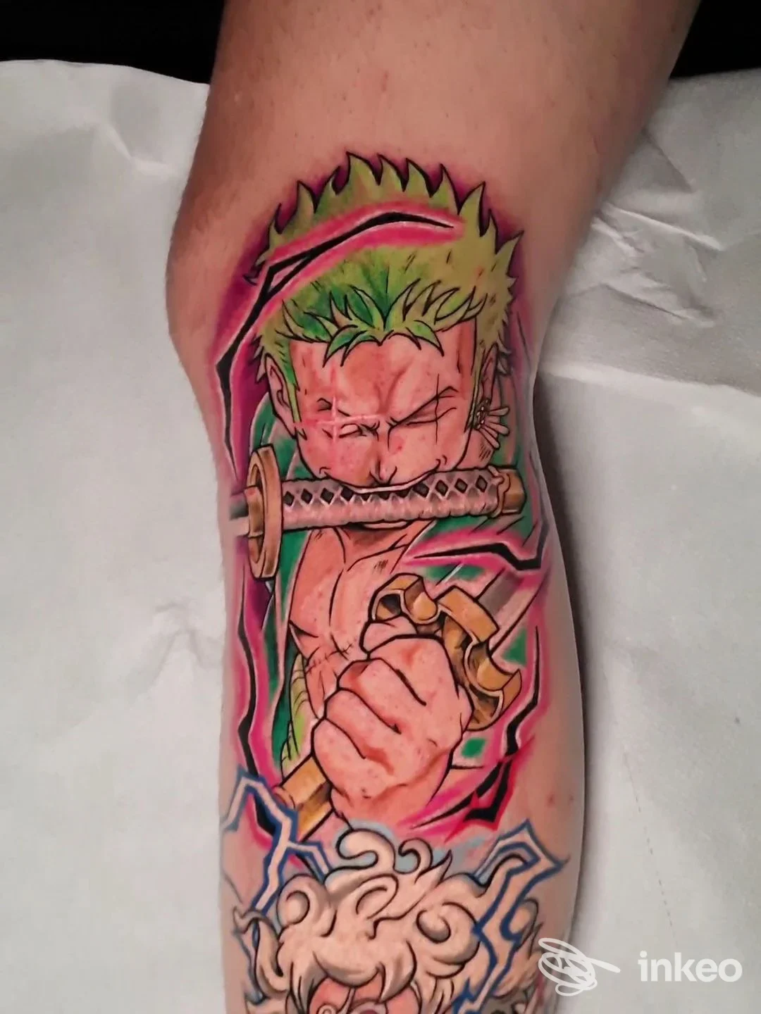 Tatuaggio colorato in stile anime sul avambraccio, fotografato presso Beauty and the Beast tattoo & nails a Lavello.