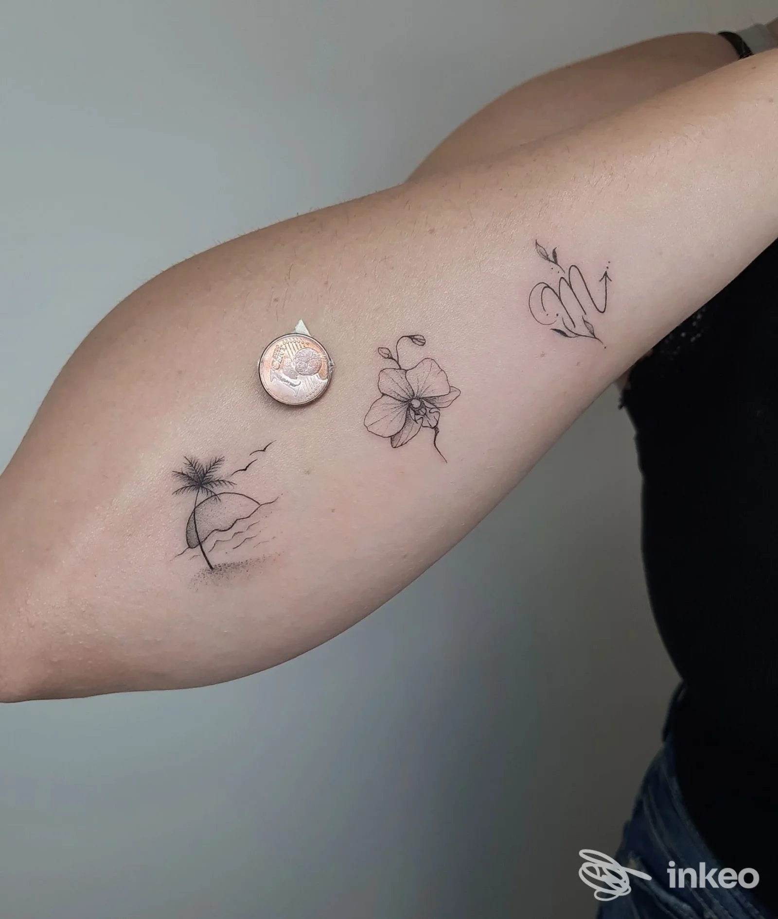 Foto del braccio con tre piccoli tatuaggi a linee sottili, Il Coniglio d'inchiostro, Ponzano Veneto.