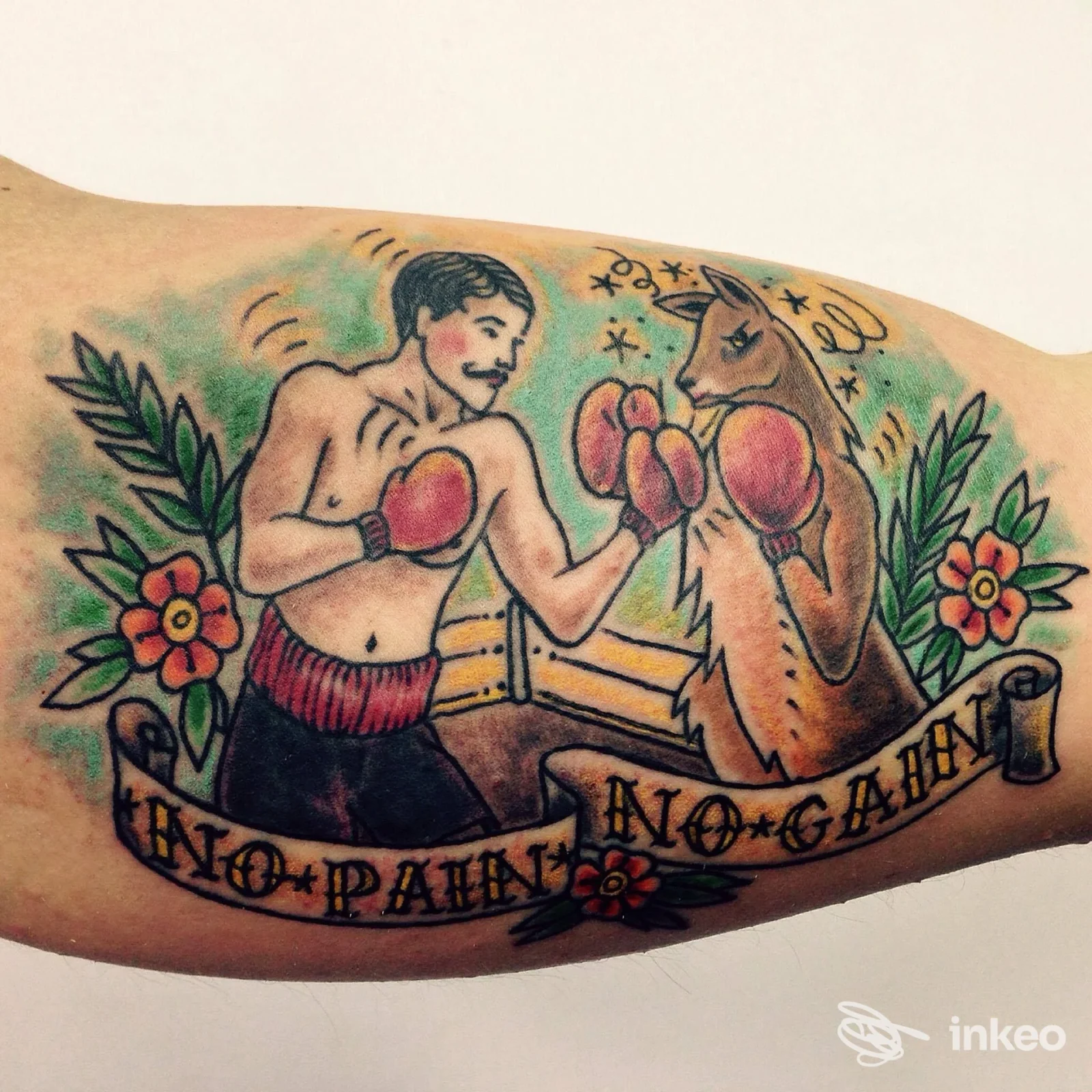 Tatuaggio su avambraccio con pugile e canguro a guantoni, realizzato da Pleasure Studio Tattoo Piercing Estetica Trucco Permanente a Bari.