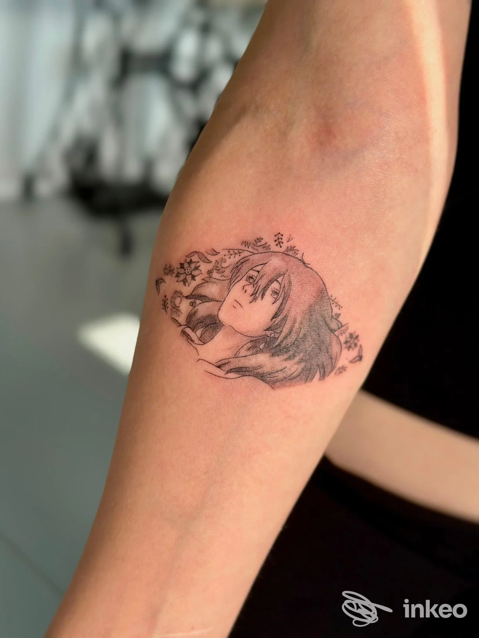 Tatuaggio in stile anime sull'avambraccio interno, realizzato da nerocorpus a Quinto di Treviso.